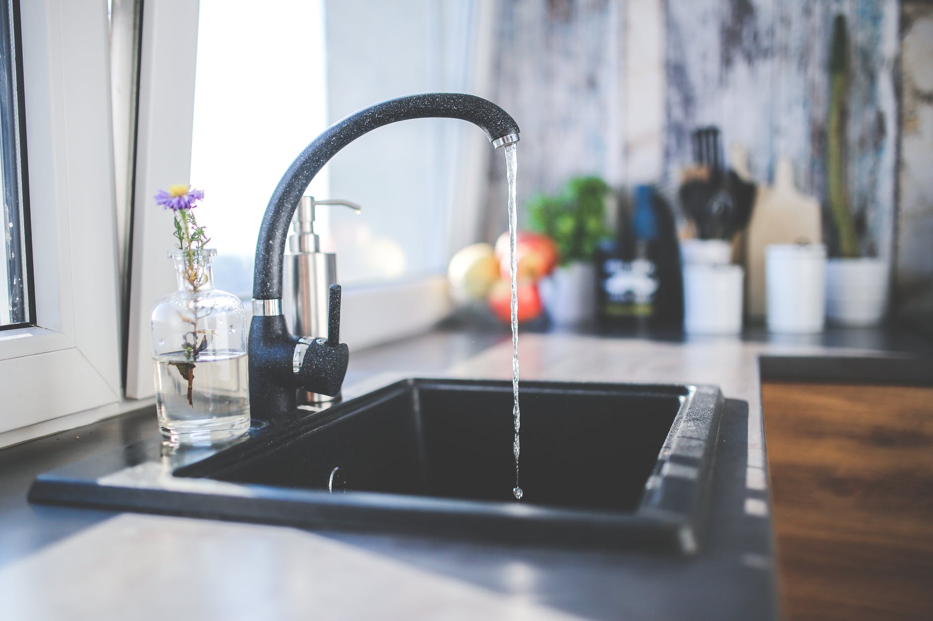 water flows from the tap to sink - weekend home improvement projects